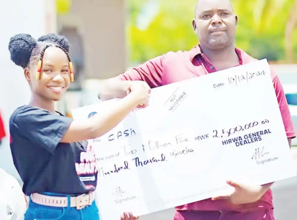 Emmie Deebo presents K2.5m to Ndirande man